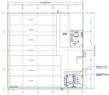 Blueprint of a large building with marked sections and measurements.