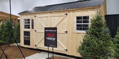 Wooden garden shed for sale priced at $4899.99.
