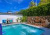 backyard: hot tub with gas fireplace