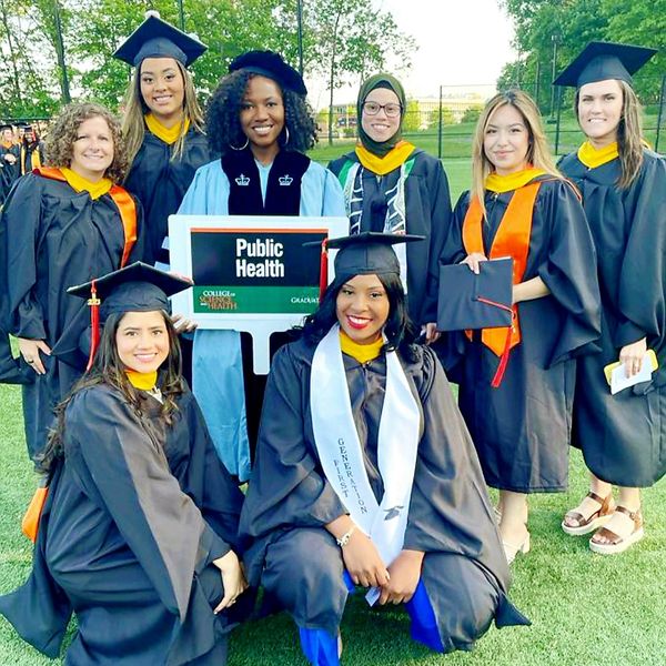 Dr. Naa-Solo Tettey with MPH graduates. 