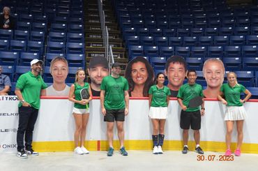 The team with their giant heads