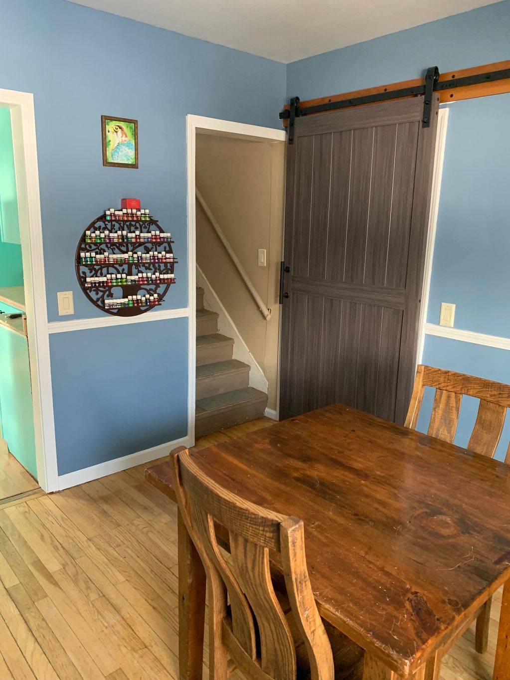 After: Dining Room Paint Upgrade. Paint color Smoky Azurite with white trim and ceiling