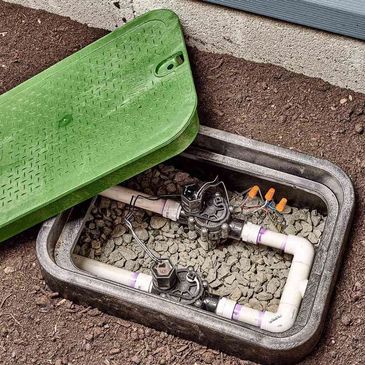 Rainbird Irrigation Zone Control Valves in a NDS Valve Box
