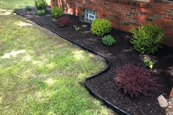 Bed Installation, plant installation and mulch installation. Lawn care service package.