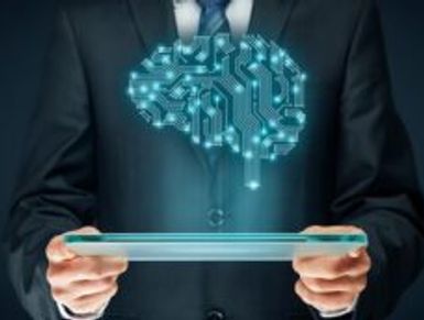 Businessman holding a tablet with a digital brain hologram.
