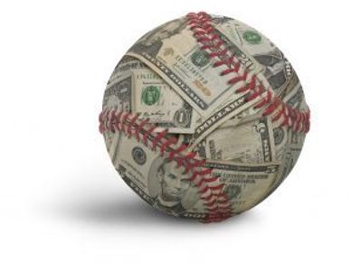 Baseball covered with various US dollar bills instead of traditional leather.