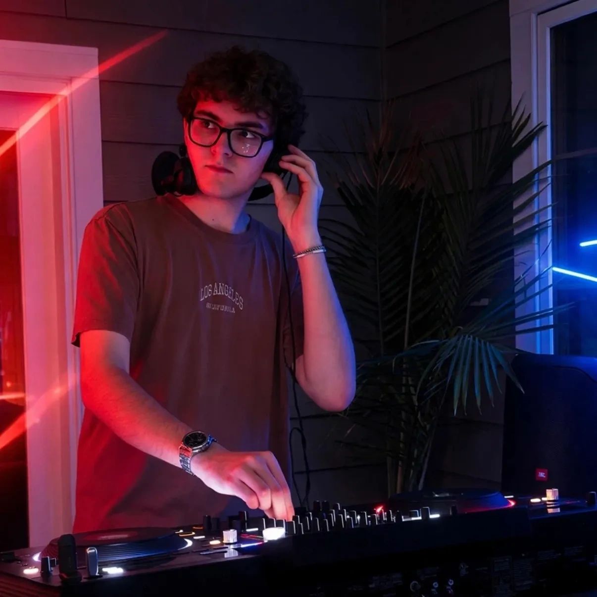 Auggie headlining a DJ festival on July 4th, 2026.