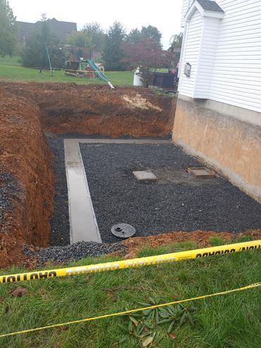 Foundation for addition with sump.