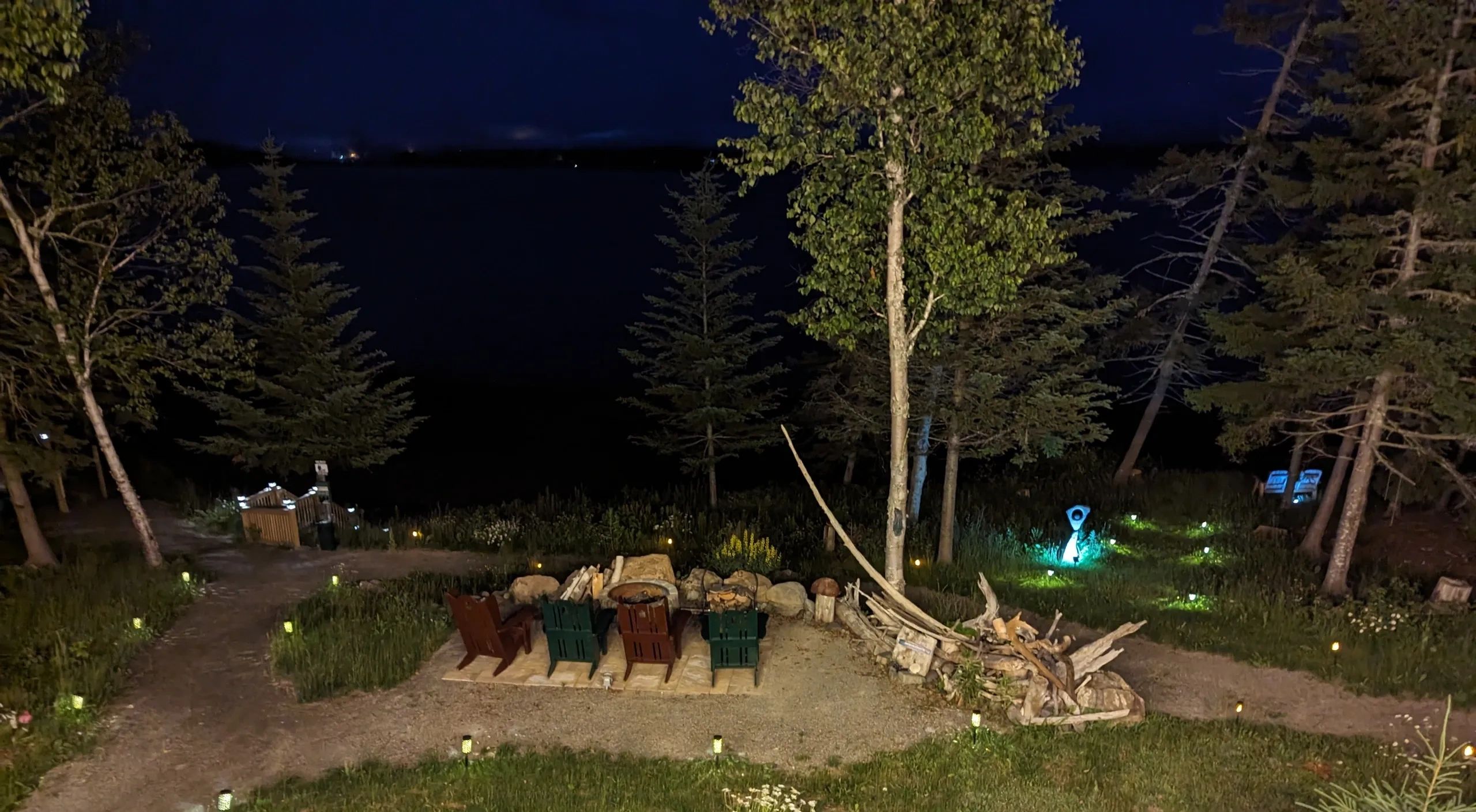 Enjoy the magical summer nightscape created by accent lighting while sitting on the Mainely deck