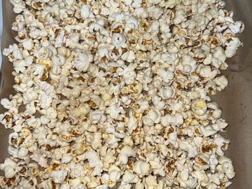 A close-up of buttered popcorn.