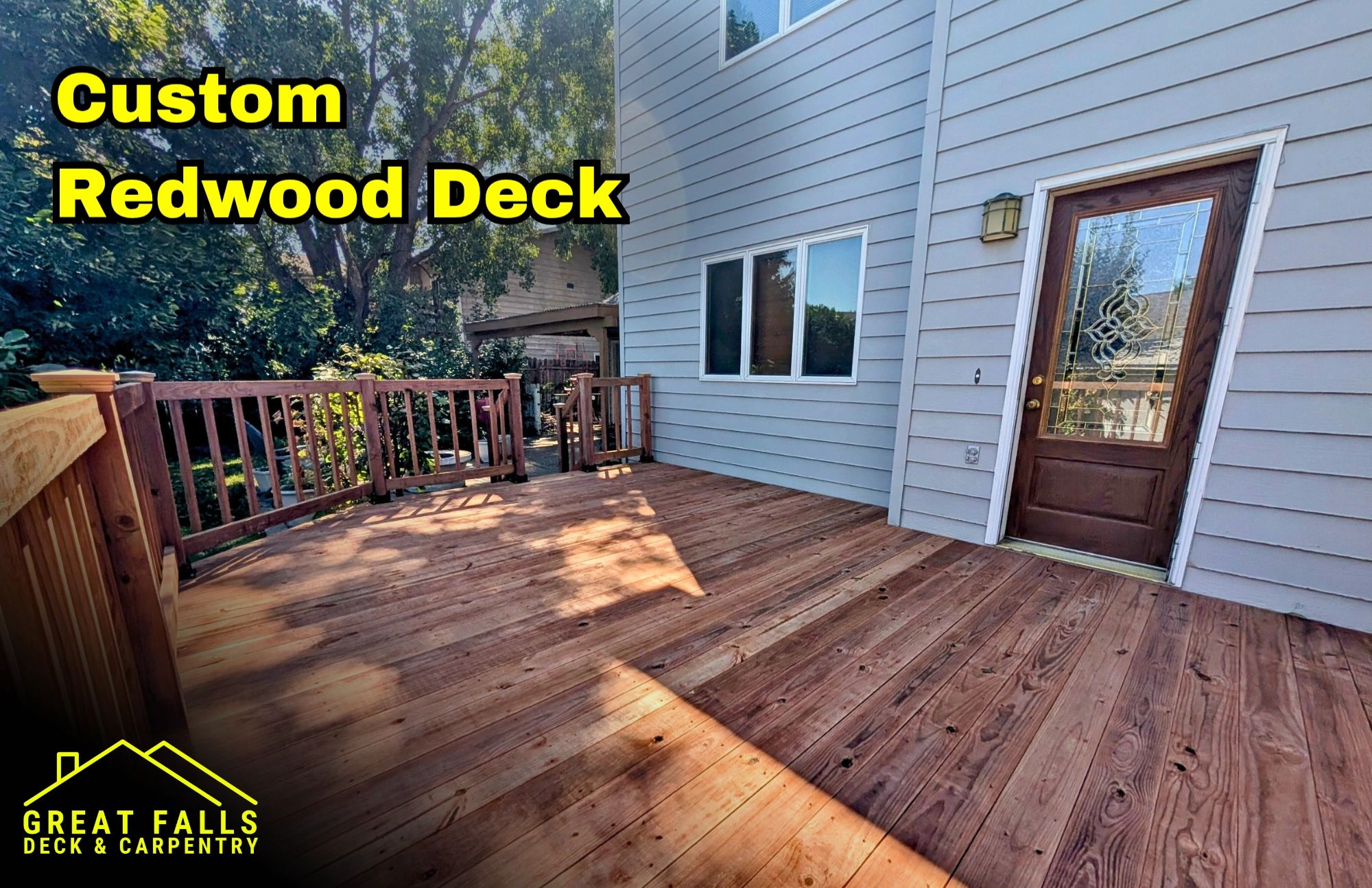 Redwood deck with wood railing by Great Falls deck contractor