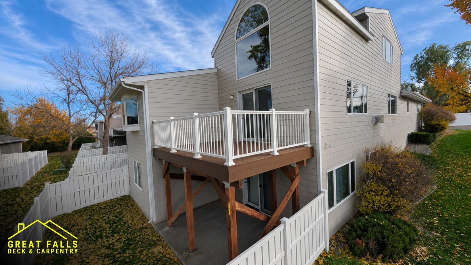 High-end composite deck with white railing in Great Falls, Montana