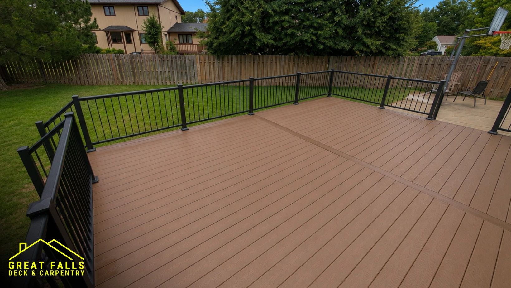 Spacious backyard composite deck designed for durability, beauty, and outdoor living.