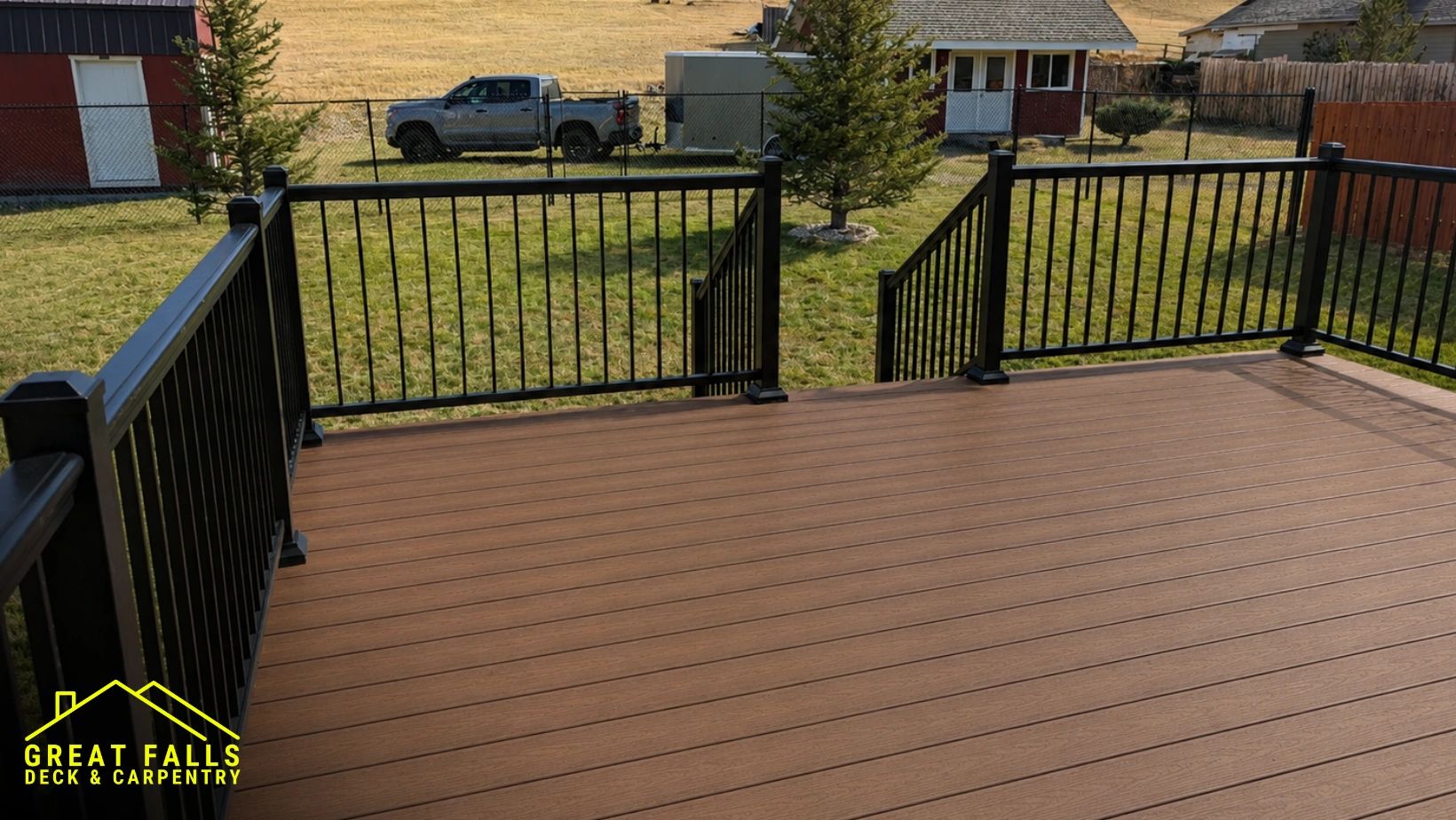 Premium composite deck featuring hidden fasteners and powder-coated aluminum railings.
