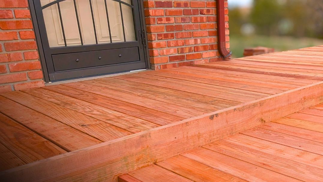 Low-profile wood deck and patio in Great Falls, Montana.