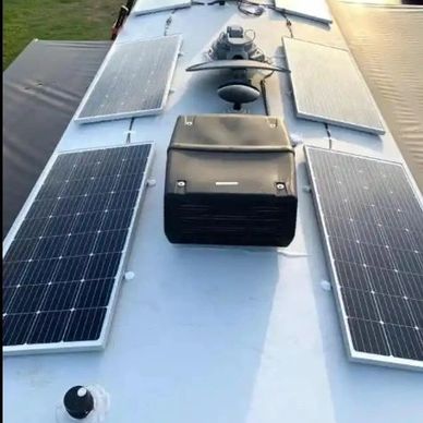 Solar panels installed on the roof of a vehicle or RV.