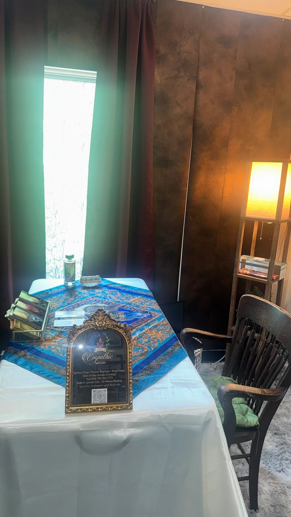 Spiritual reading setup with decorative items and warm lighting.