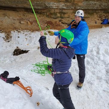 PRCA climber Emma belaying with a backup belay from our president Bryan.