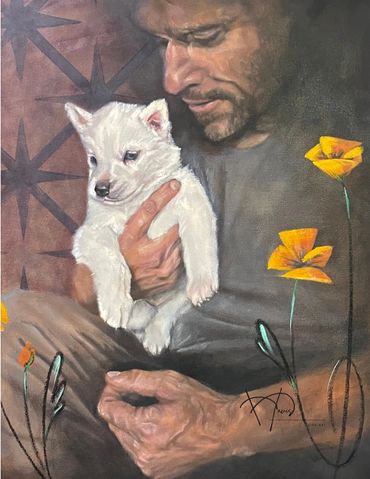 A man holding a puppy