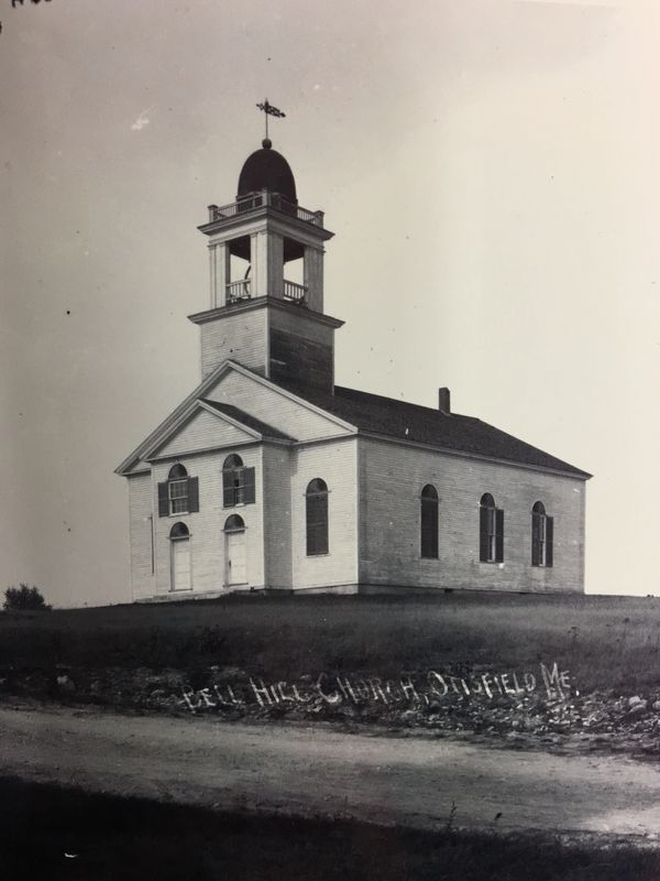 Historic Bell Hill Church in Otisfield, Maine, captured in black and white.