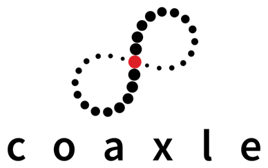 A black silhouette of a city skyline with a red dot above it.