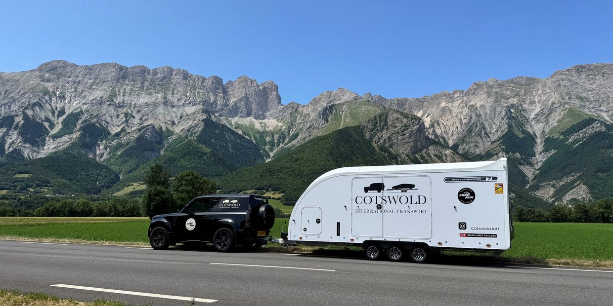 Land Rover Defender in French Alps. Brian James RT7, enclosed car transport