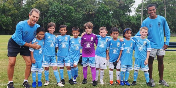 BFUT U9 players with Coach Thadeu and Educator Jordan