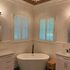 Arched plantation shutter