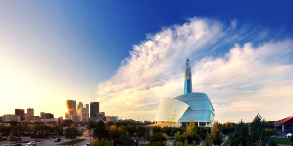 Skyline of Winnipeg at sunset with iconic architecture and vibrant cityscape in Manitoba, Canada.
