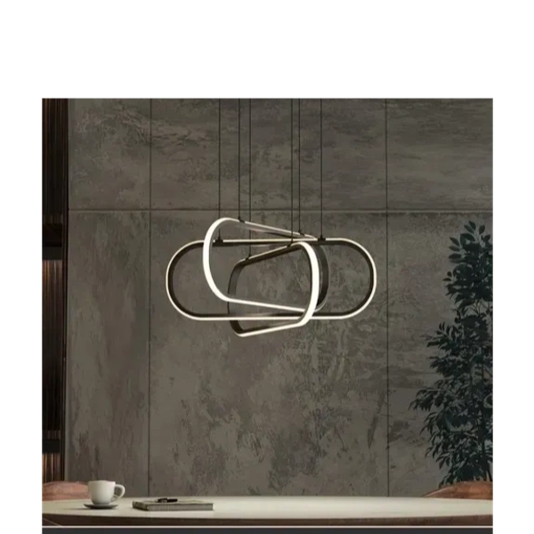 Modern Artika LED pendant light fixture over a stylish living room dining set