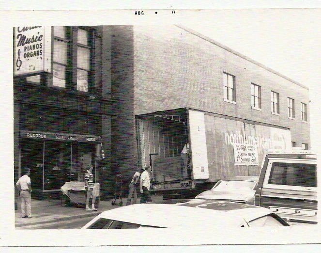 Another shot of unloading pianos/organs at Curtis Music Store, Lynn MA.
The kid in the stripped shir