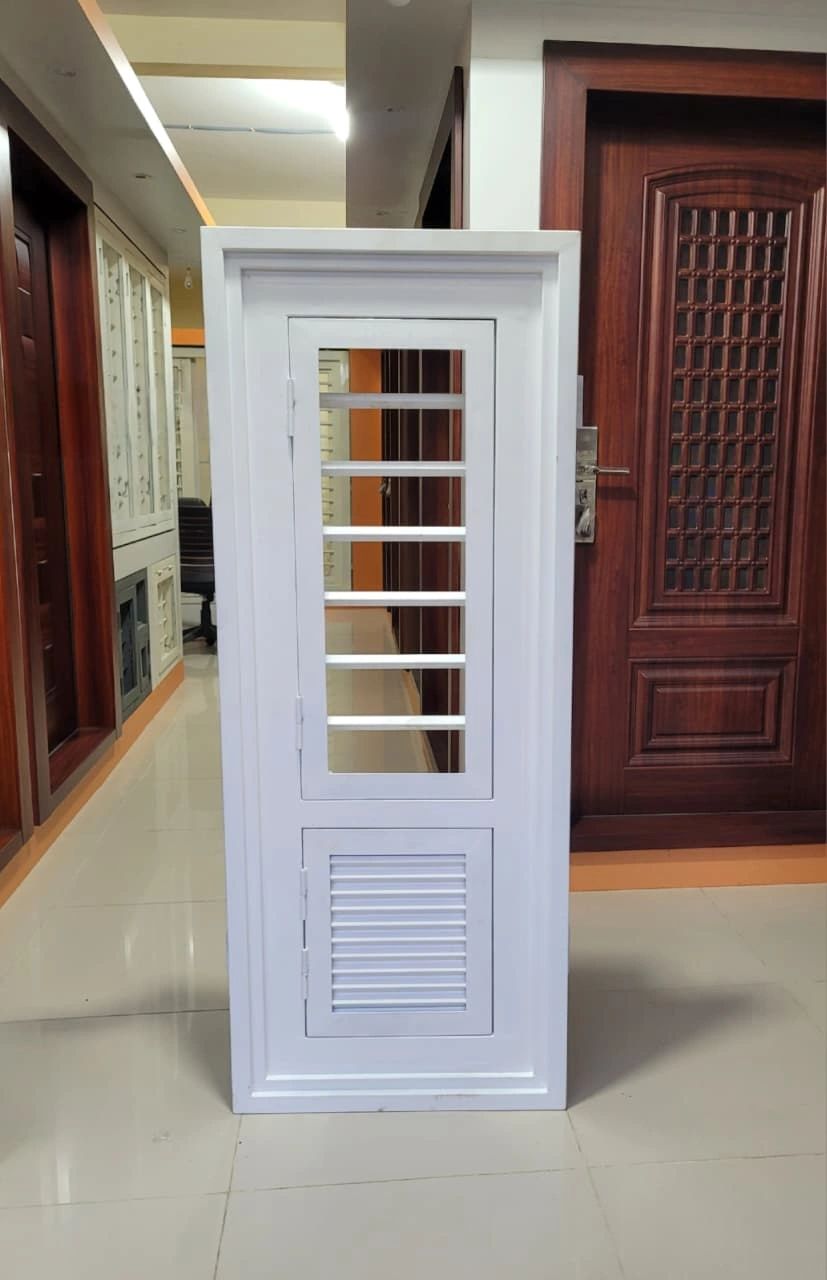 White metal door with two sections, one with horizontal bars and the other with louvres.