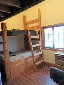 View of a bunk with lockers below . . . .