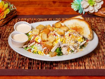 Chicken salad with croutons and dressing.