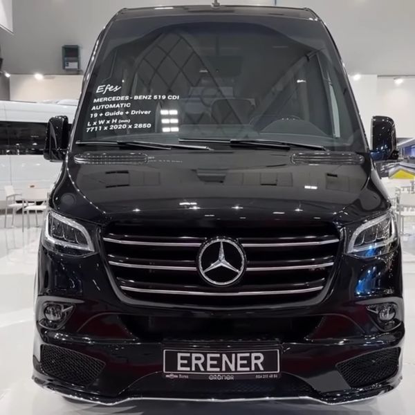Front view of a black Mercedes-Benz 519 CDI van with sleek design.