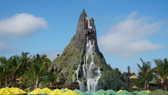 Universal Studios Water Theme Park Volcano Bay rides attractions winding river swim slides beach