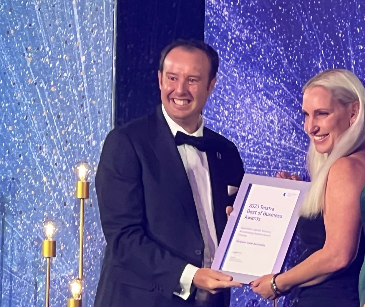 Bec Skipper receiving an award