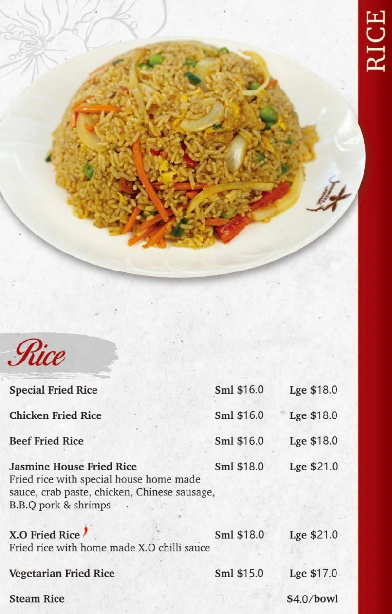 Plate of fried rice with vegetables and menu listing various fried rice options and prices.