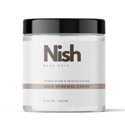 Nish Sole Renewal Crème in a white jar with black lid.