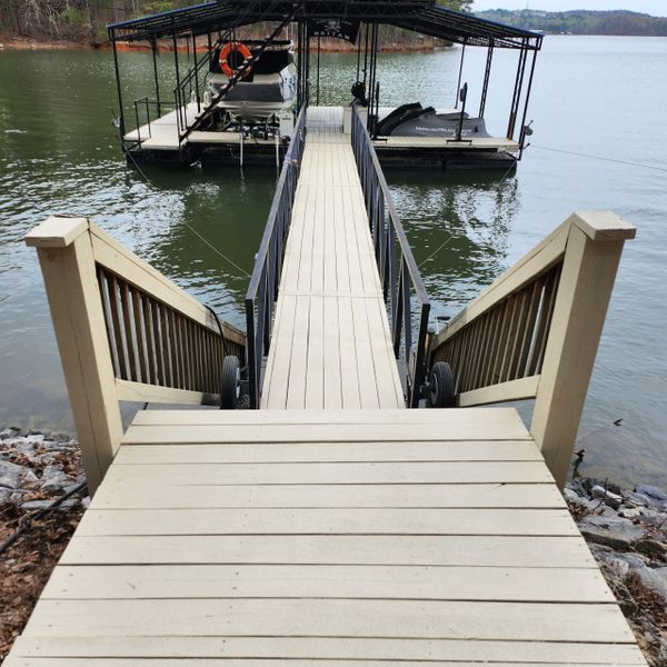 Dock at Lake Lanier, pressure washed, resurfaced and sealed with UV coating.