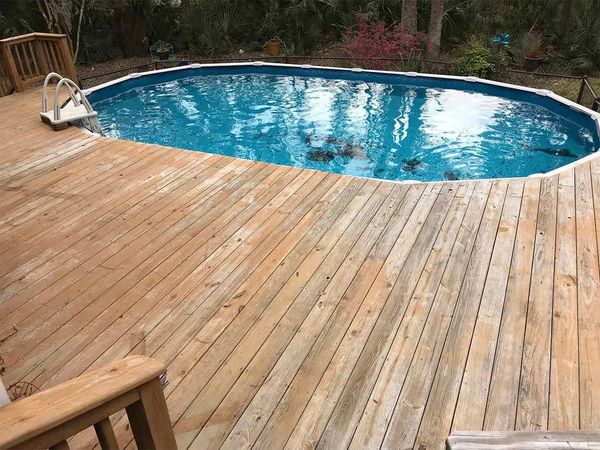 Before image of pool deck.