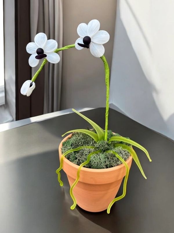 Torchwork glass orchid flowers in pot