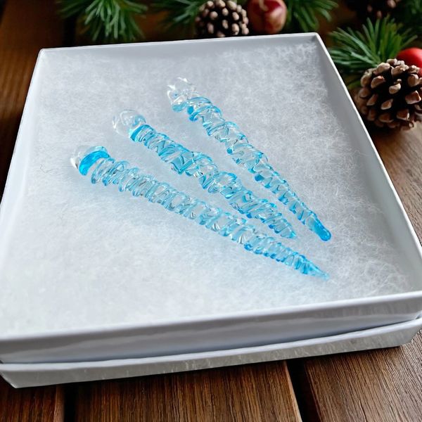 Clear and blue glass icicle tree ornaments