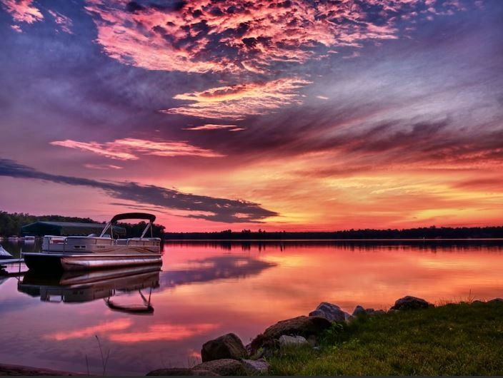 Pontoon Boat sunset on the lake.
