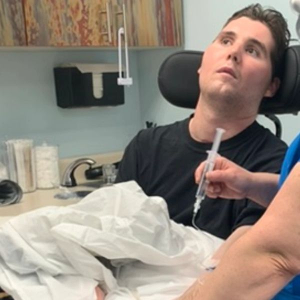 Kyle receiving his second stem cell infusion in Feb. 2021