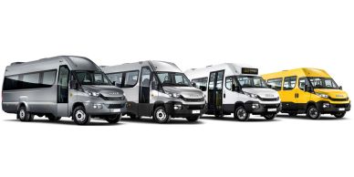 Four different model minibuses in a row.