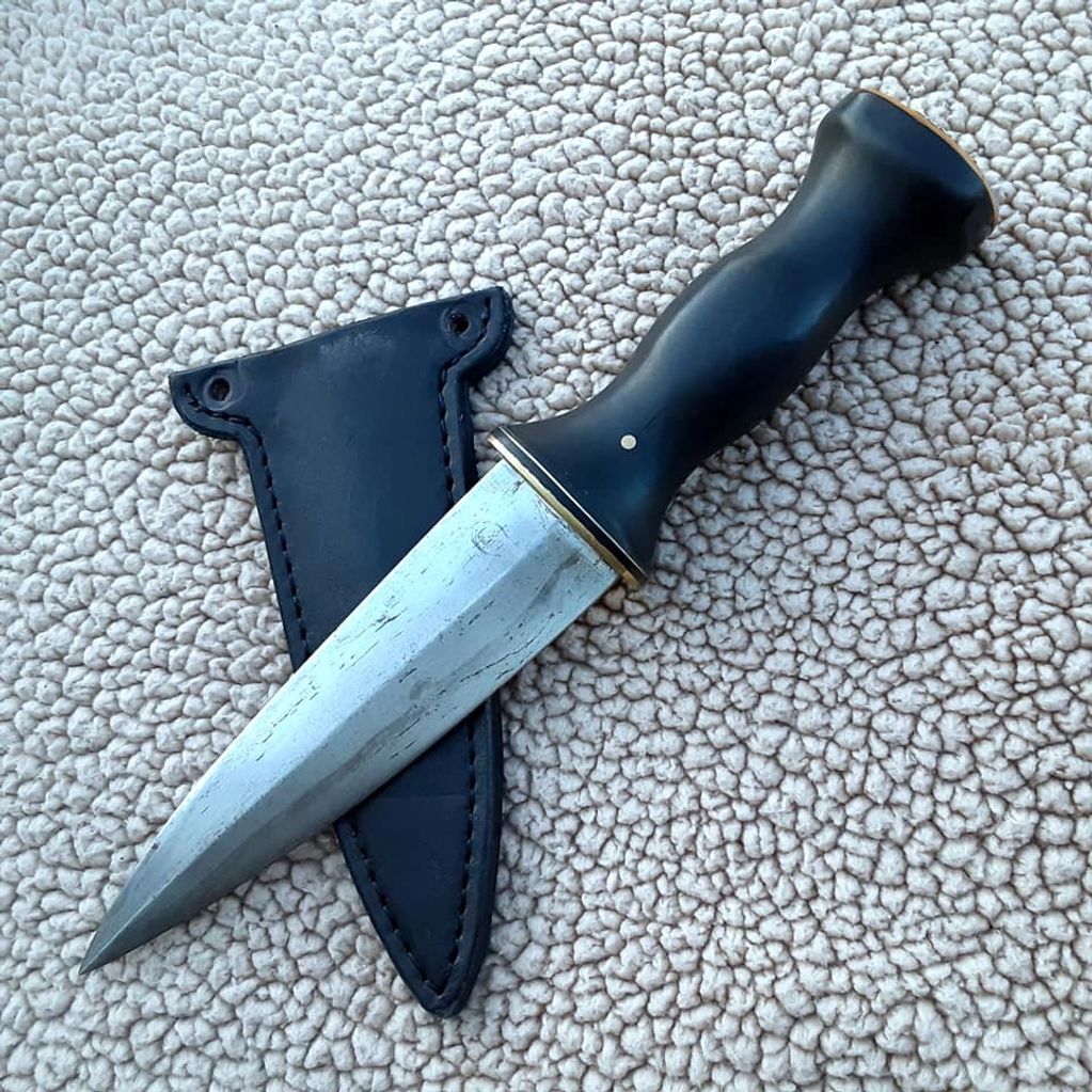 A wrought Iron and ebony Athame. 