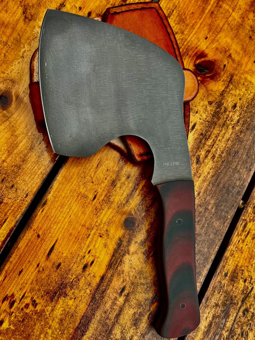 Acid-washed Hunter's Hatchet with Maroon and Black G10 Scales. Black G10 Pins. 