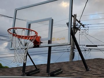 
Roof-mounted 60 in fixed height basketball system.