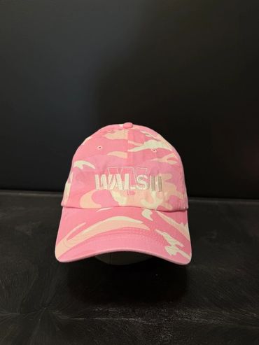 Pink camo baseball cap with WALSIL text.